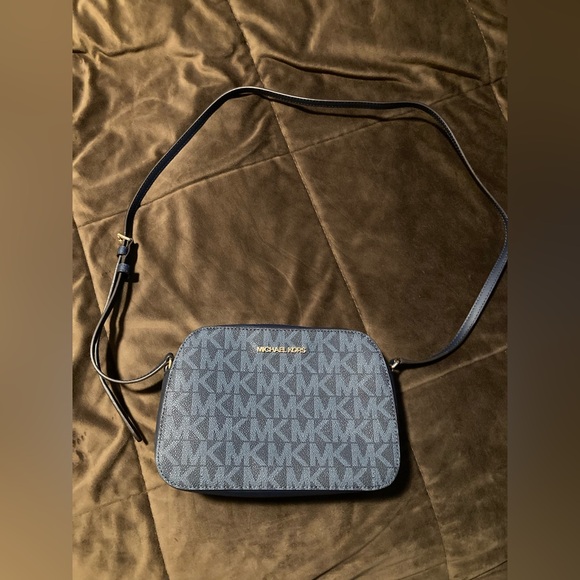 Michael Kors brand, dark blue, crossbody purse. - Picture 9 of 11